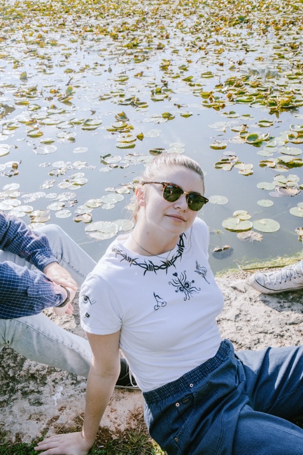 Garment photographed near a lily pond